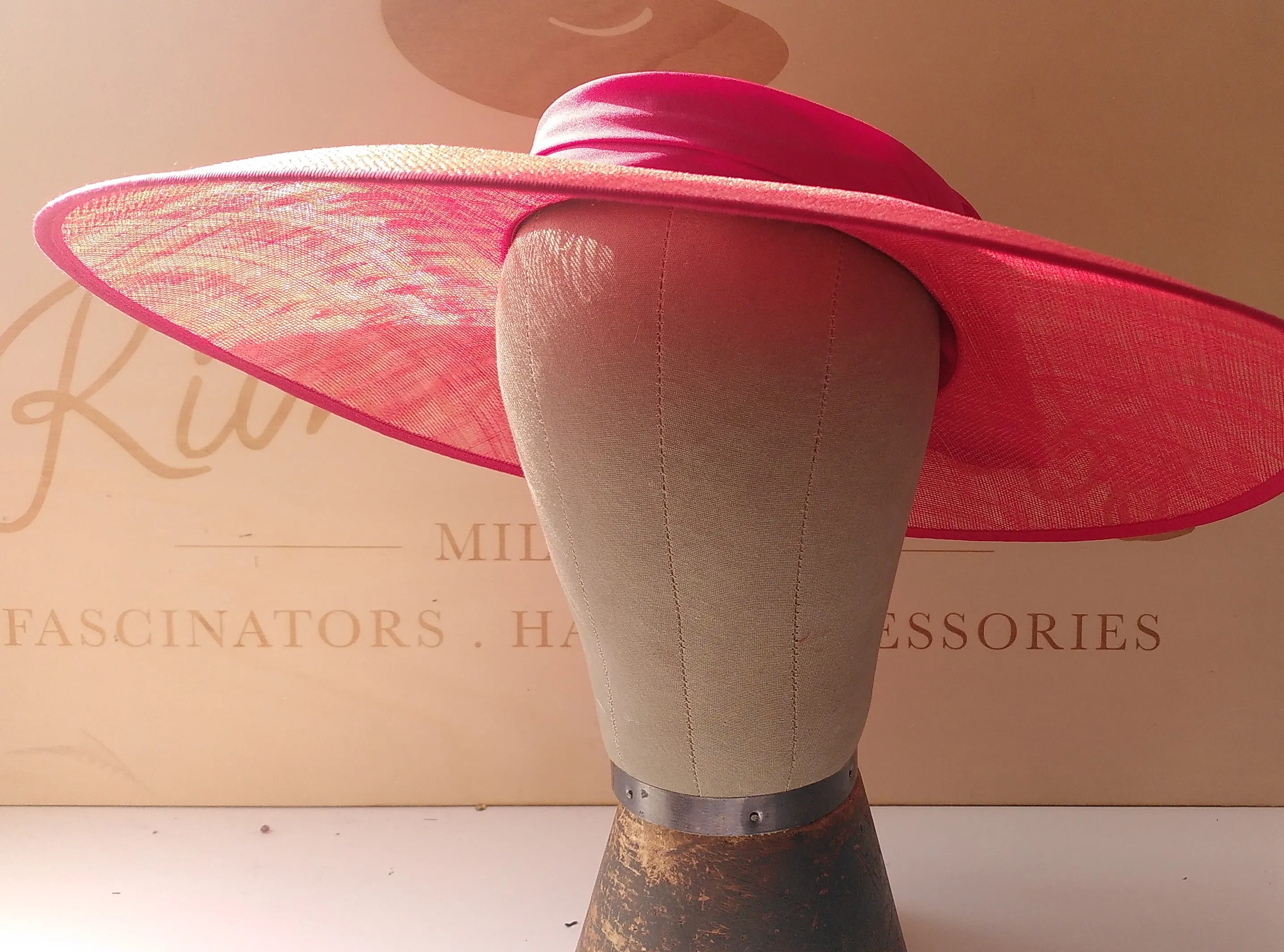 Red wedding hat with silk red bow.